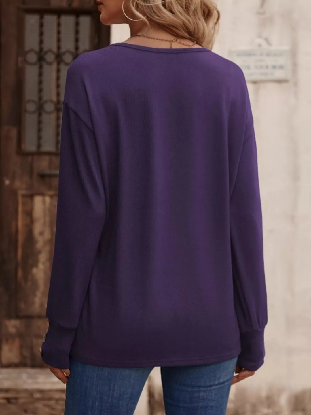 V-neck long sleeve top with button cuffs
