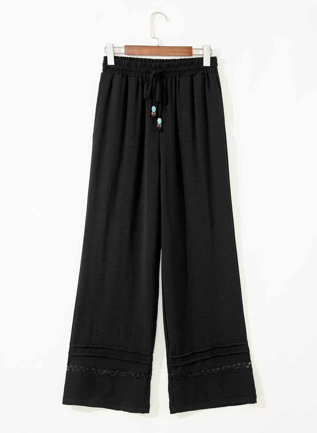 Wide leg drawstring pants with embroidered lace hem