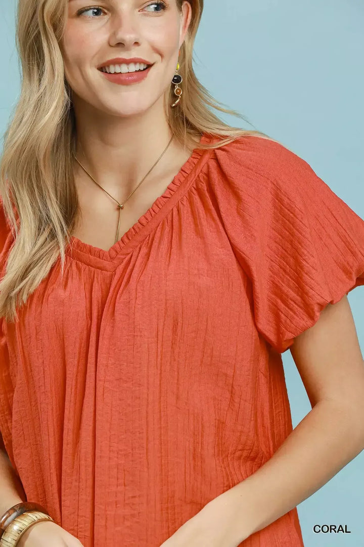 Relaxed gathered V-neck top with flutter sleeves