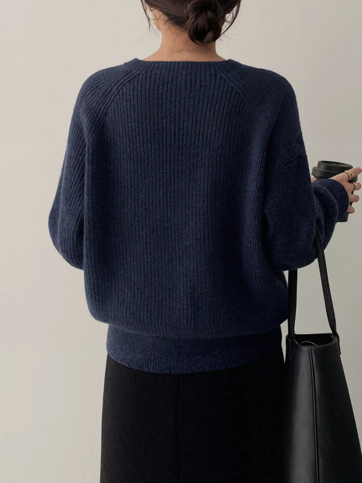 Ribbed knit round neck sweater with shoulder button detail