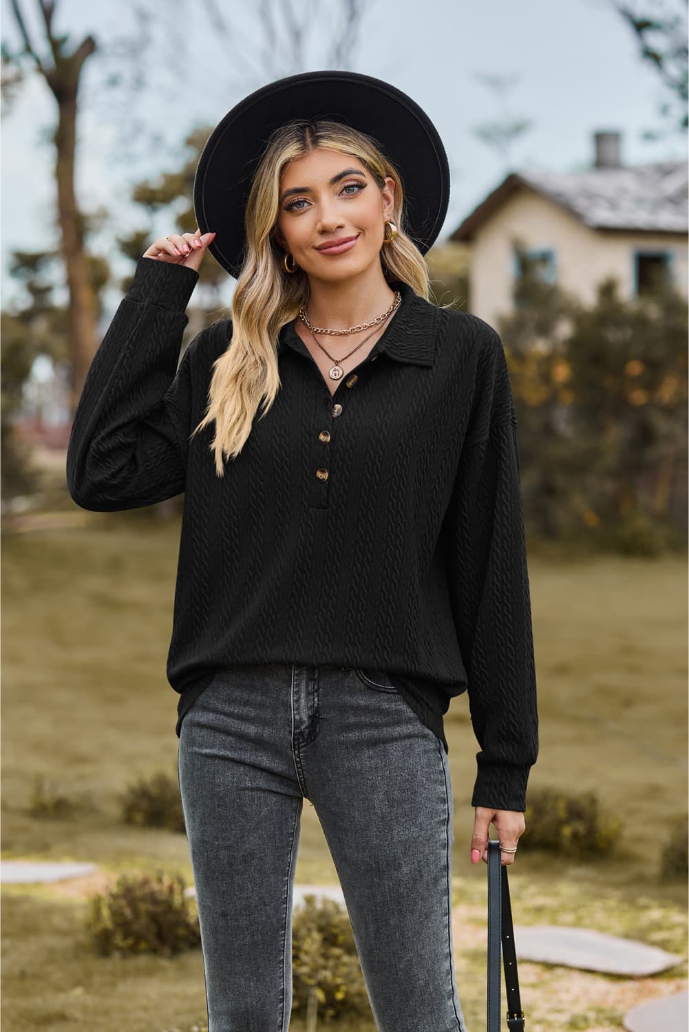 Black Textured knit collared top with half-button placket
