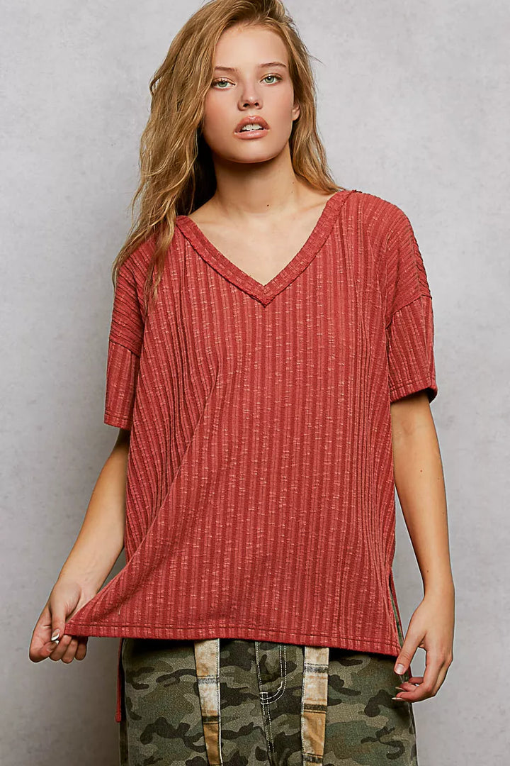Ribbed knit V-neck tee with exposed seam and side slits