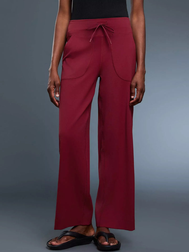Wide-leg drawstring pants with curved front pockets