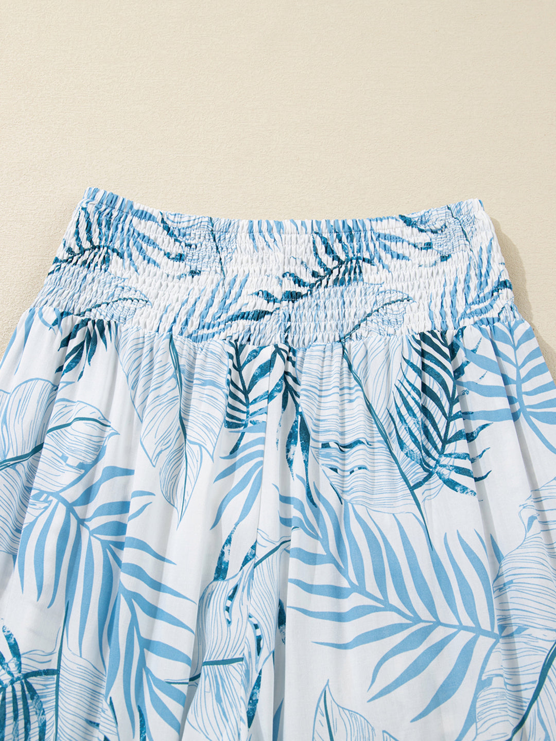 Tropical leaf print shirred-waist wide-leg pants