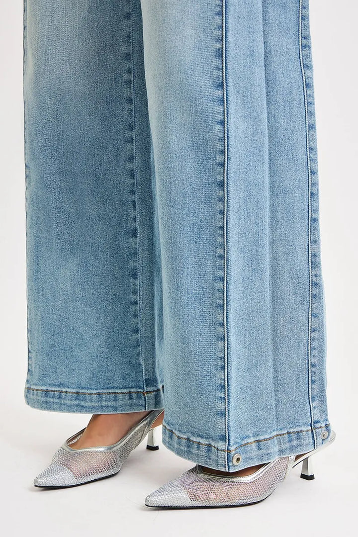 Mid-rise wide barrel jeans with adjustable snap hem
