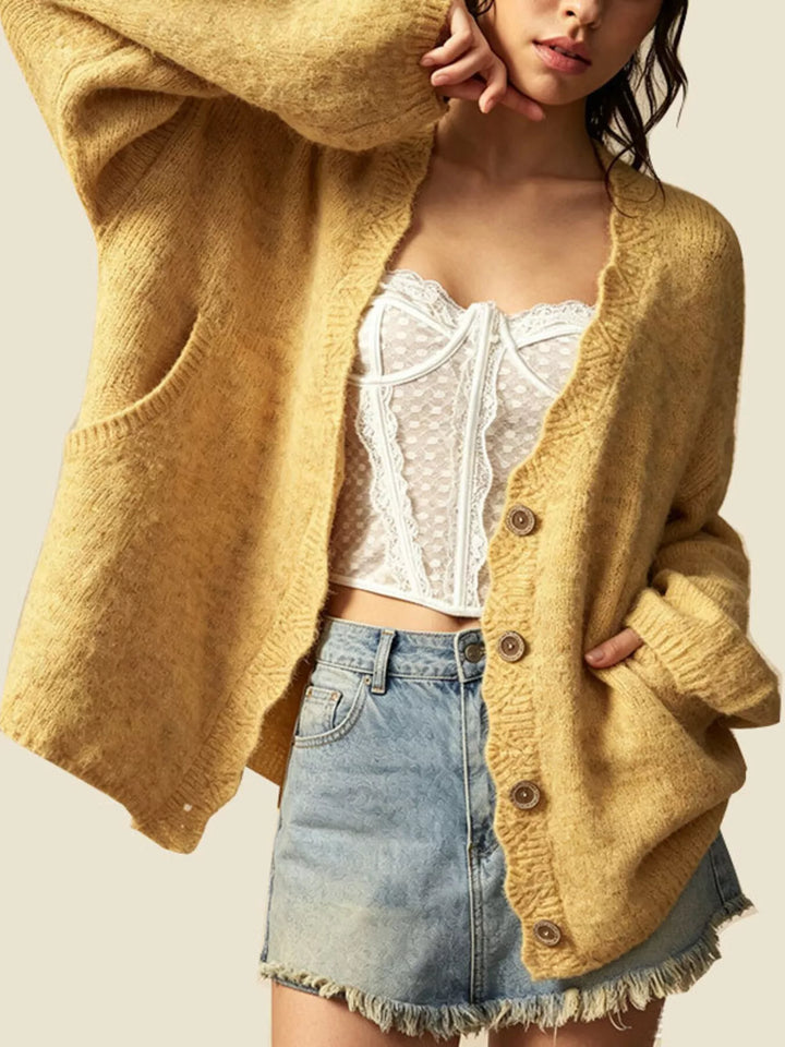 Oversized V-neck button-down knit cardigan with textured trim
