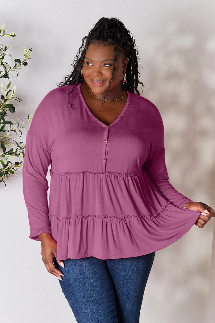 Lilac Half-button long sleeve blouse with tiered ruffle hem