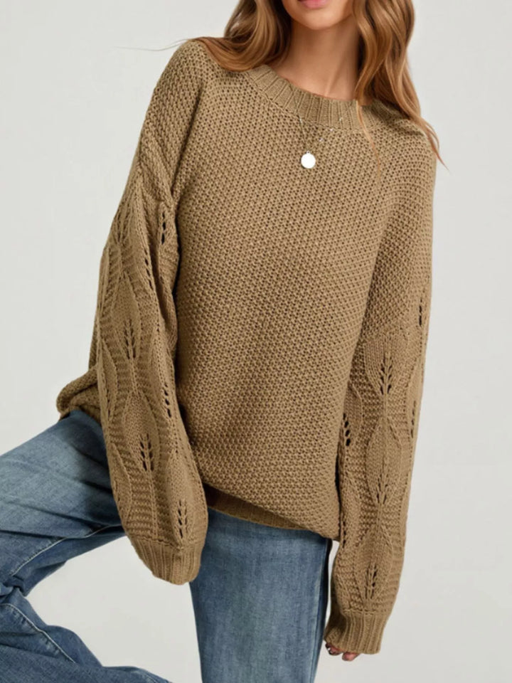 Openwork knit dropped shoulder sweater with curved hem