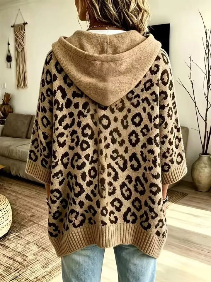 Leopard print drawstring hooded sweater with dolman sleeves
