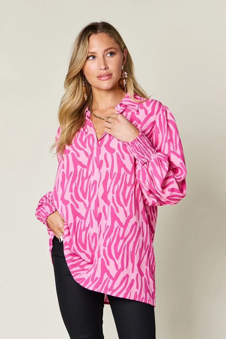 Deep Rose Zebra print smocked-cuff long sleeve blouse