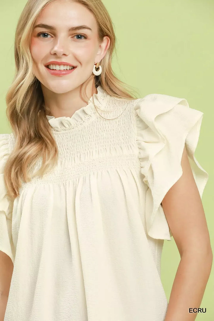 Smocked yoke ruffle flutter sleeve blouse