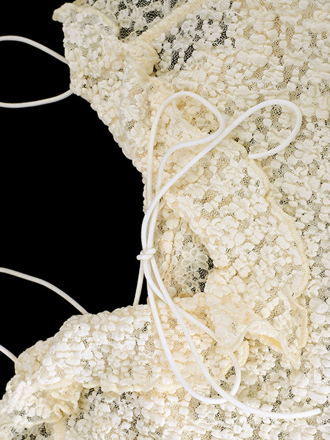 Lace tie-front cami with ruffle trim and asymmetric hem