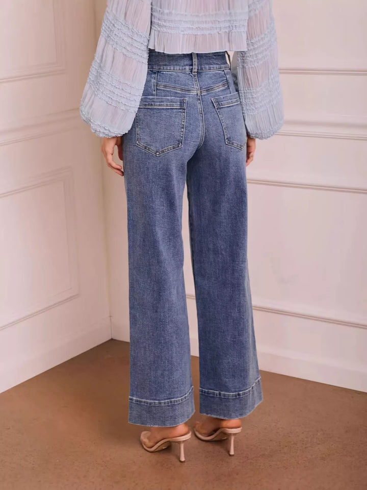 Washed high-rise wide-leg jeans with released hem