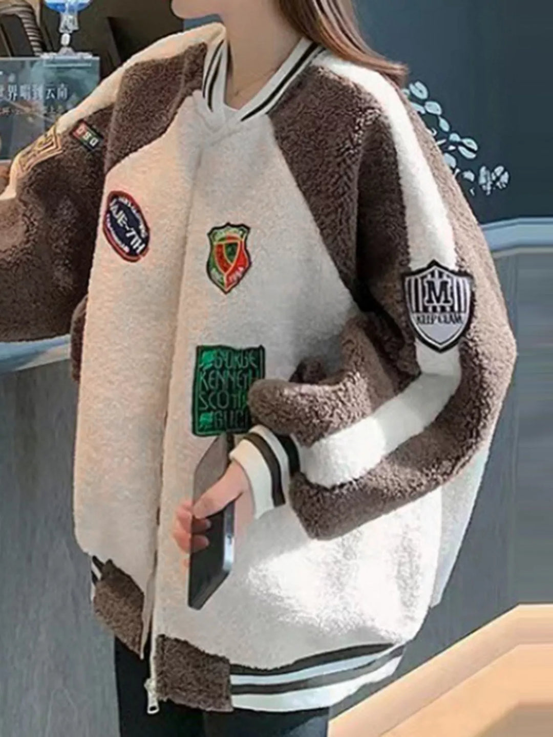 Zip-up sherpa fleece varsity jacket with embroidered patches