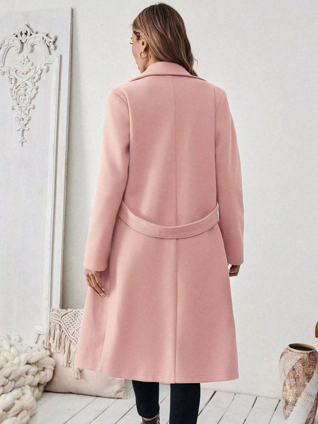Longline notch lapel coat with single-button waist tab
