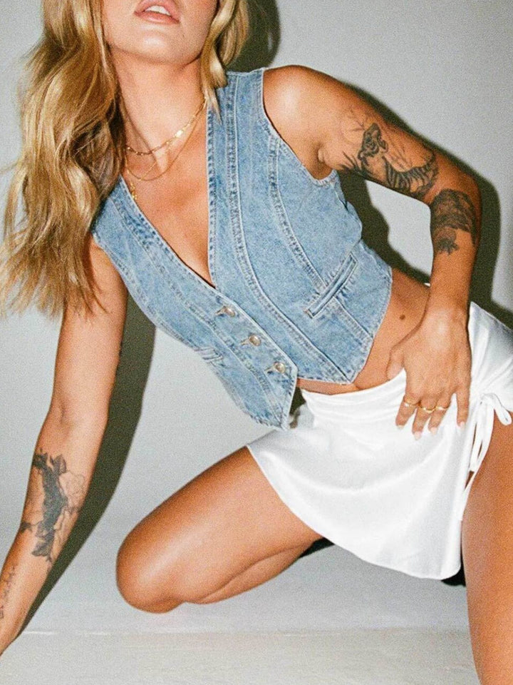 V-neck button-up cropped denim vest with welt pockets