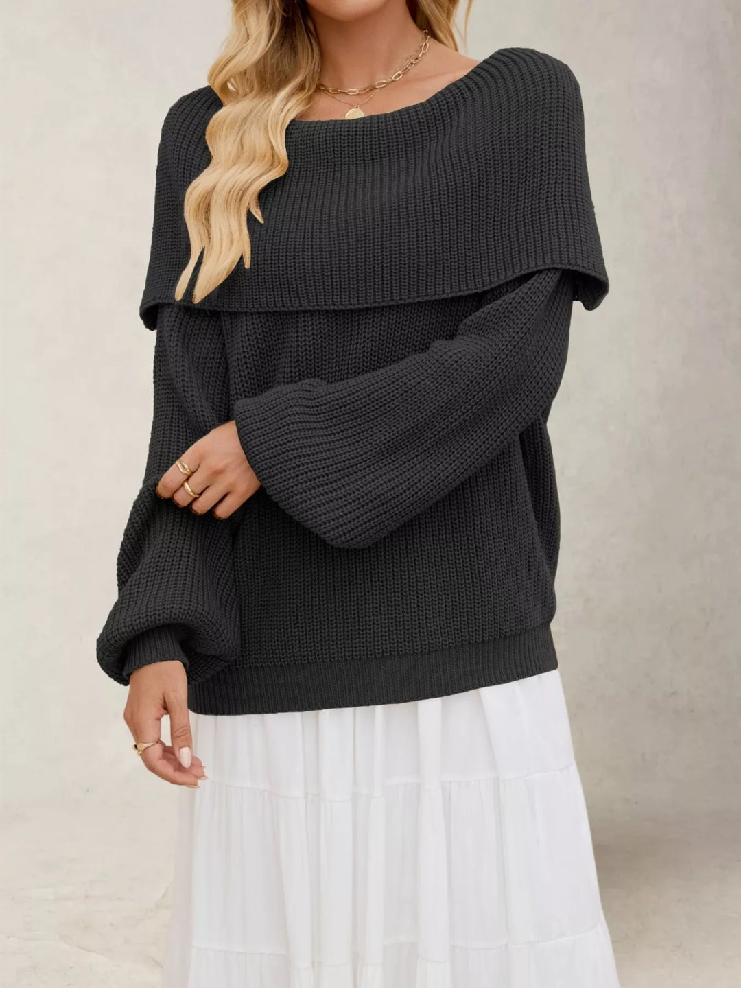 Black Off-shoulder ribbed knit sweater with foldover collar