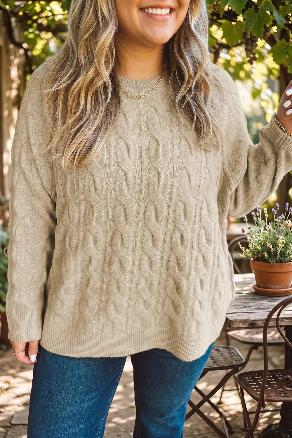 Oversized cable knit crew neck sweater with drop shoulders