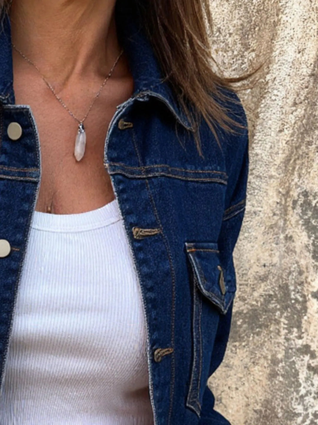 Classic button-up denim jacket with chest flap pockets