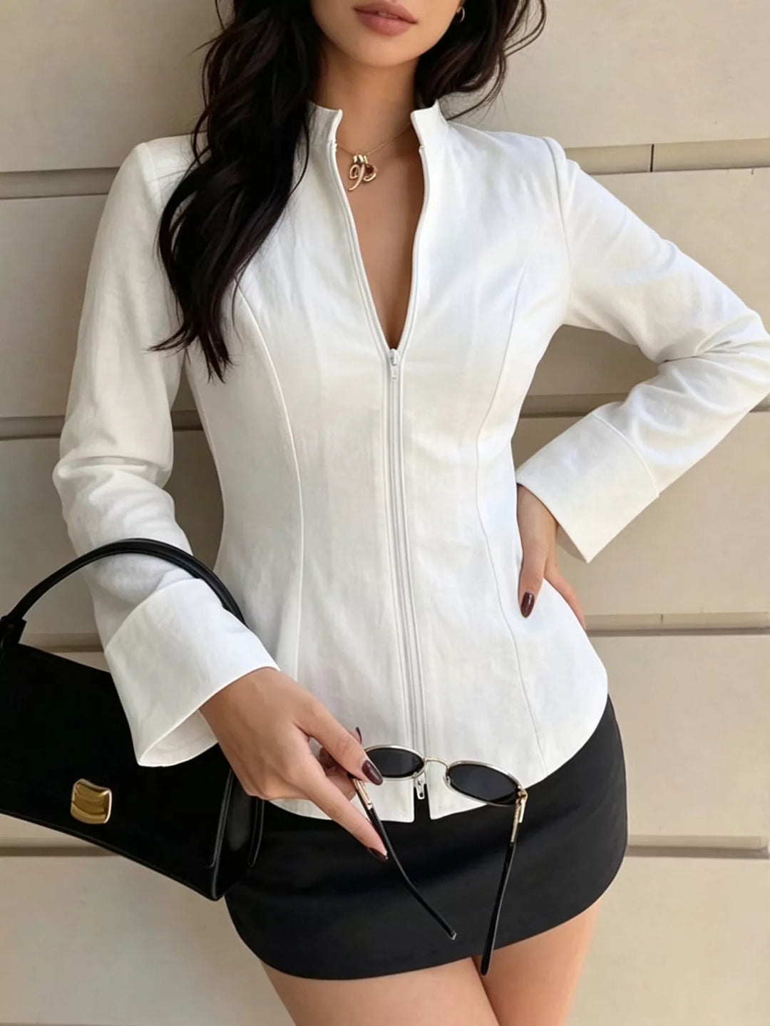 Zip-front mock neck top with flared cuffs