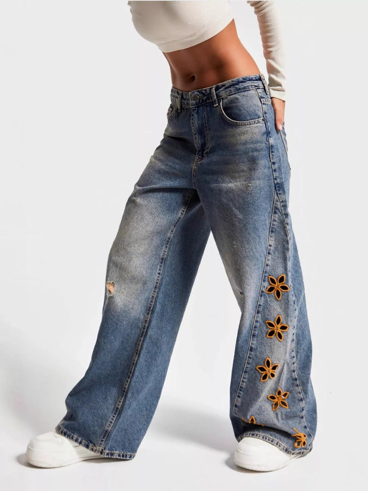 Blue Distressed wide leg jeans with floral embroidery