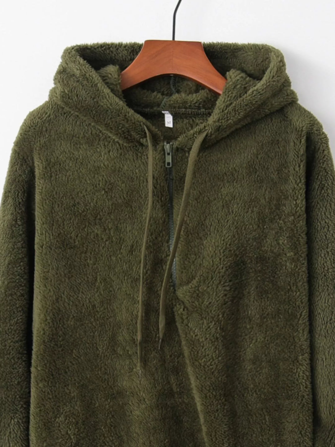 Plush half-zip fleece hoodie with drawstring hood and pockets