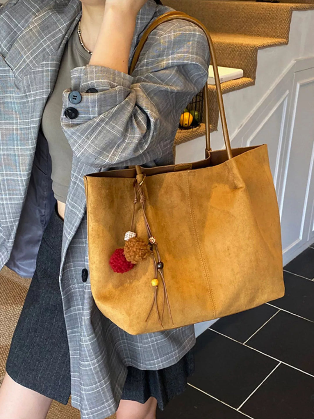 Large slouchy suede shoulder tote bag with pom charm