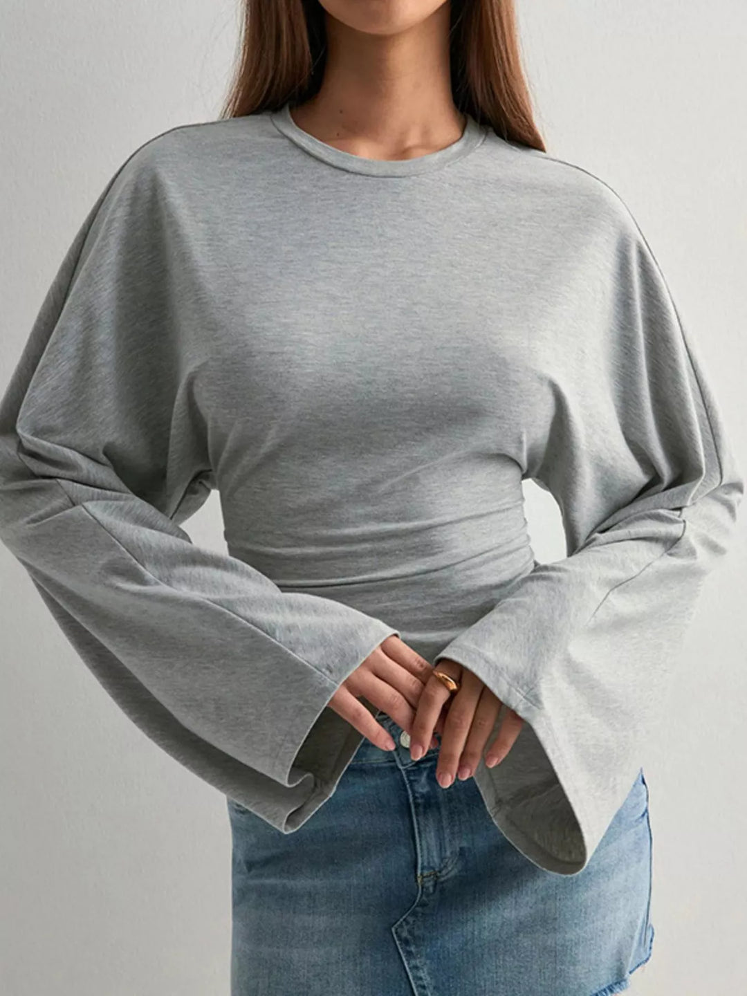 Fitted long sleeve top with flared bell sleeves