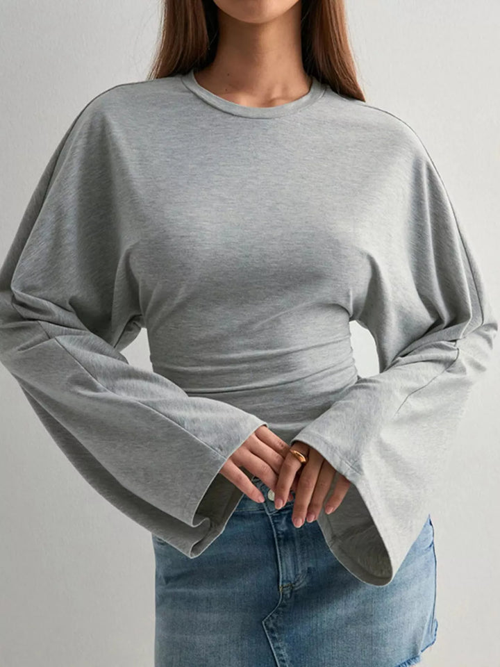 Fitted long sleeve top with flared bell sleeves