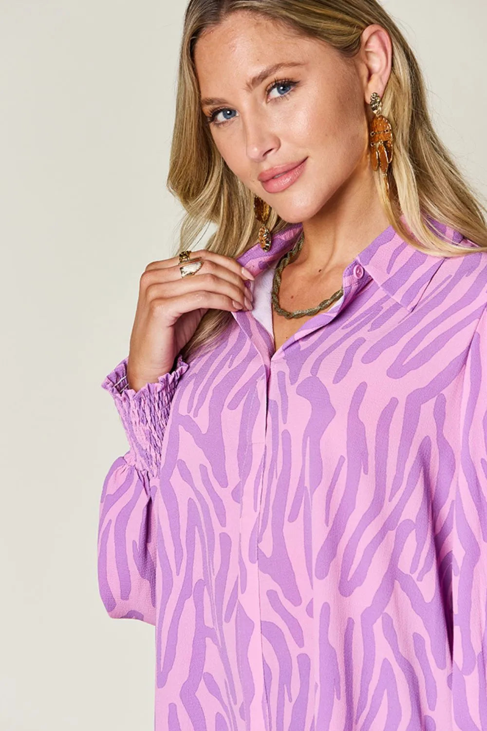 Zebra print smocked-cuff long sleeve blouse