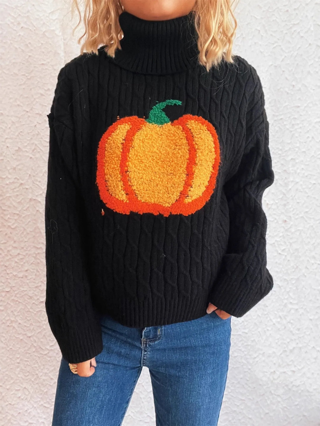 Black Pumpkin applique cable knit turtleneck sweater