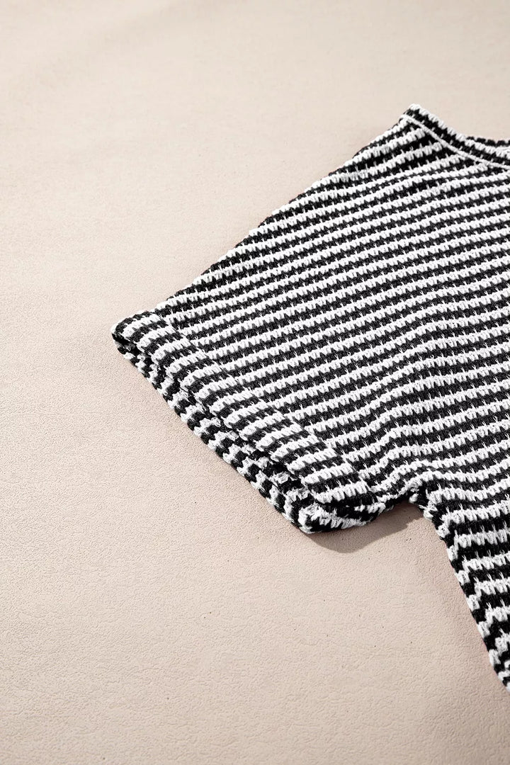 Striped textured knit top with notched V-neck and cuffed sleeves