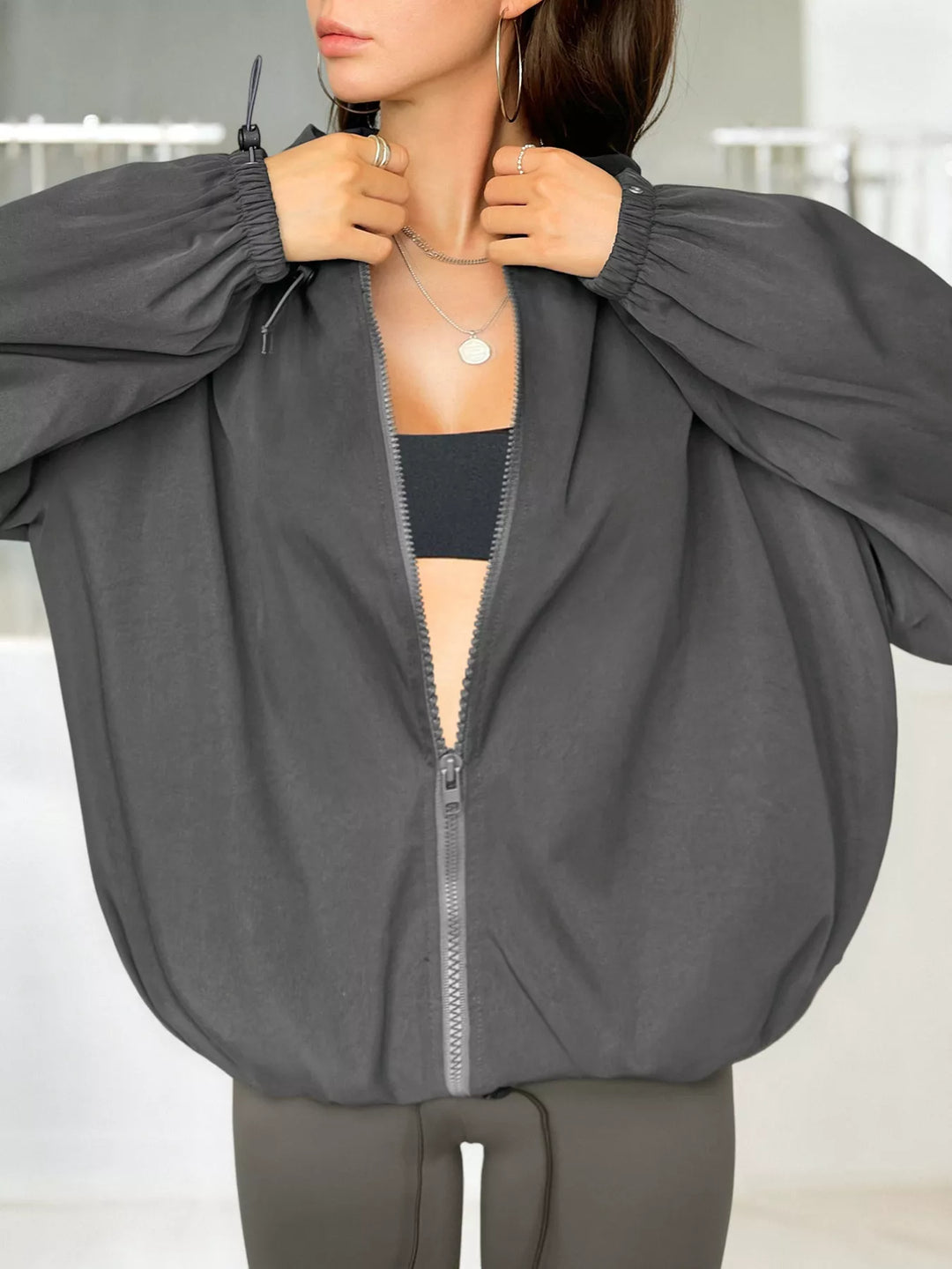 Drawstring hooded zip-up windbreaker jacket with pockets