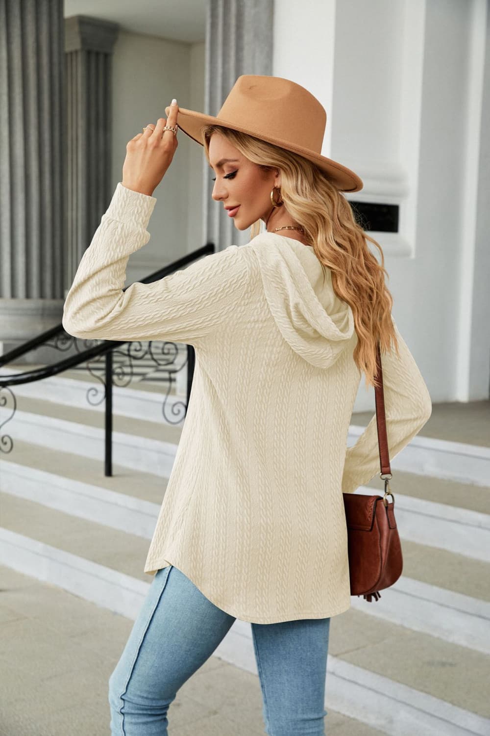 Cable knit hooded top with tie neck and button placket