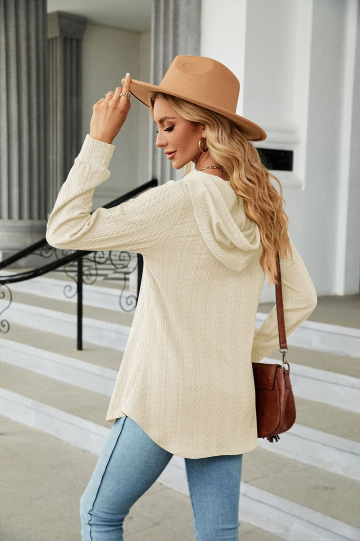 Cable knit hooded top with tie neck and button placket