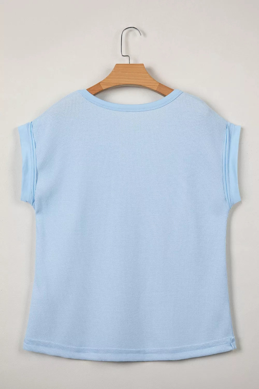 Waffle knit pocket tee with cuffed short sleeves
