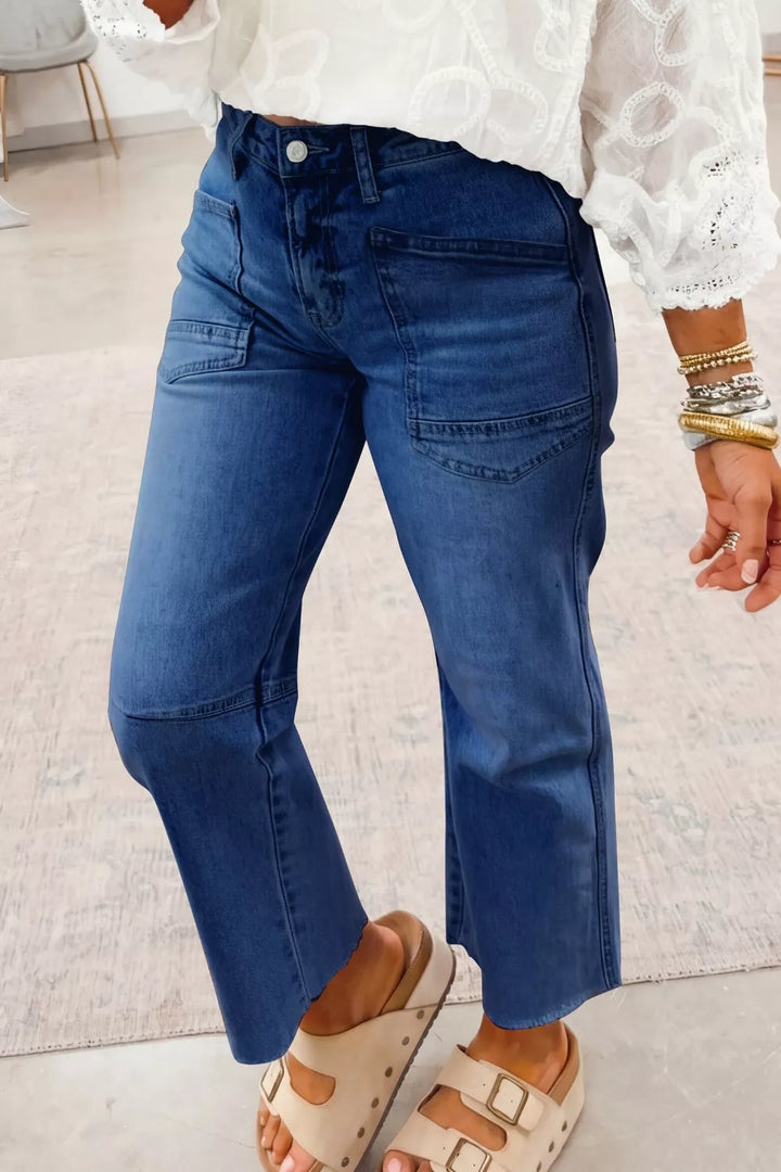 High-rise straight-leg jeans with patch pockets and raw hem