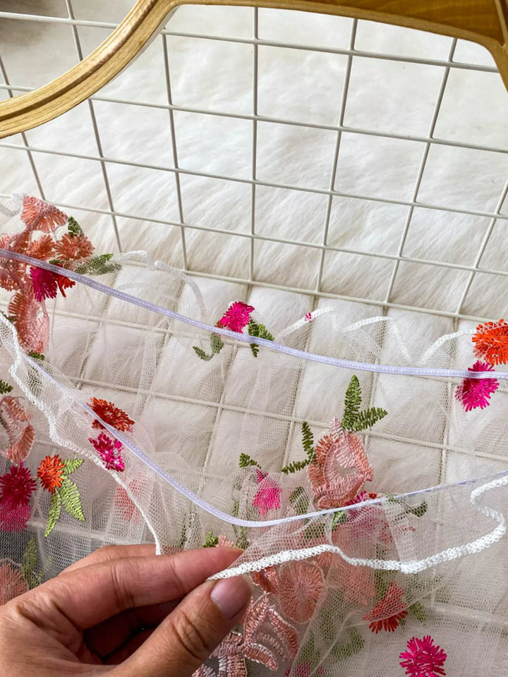 Floral embroidered off-shoulder mesh crop top with puff sleeves