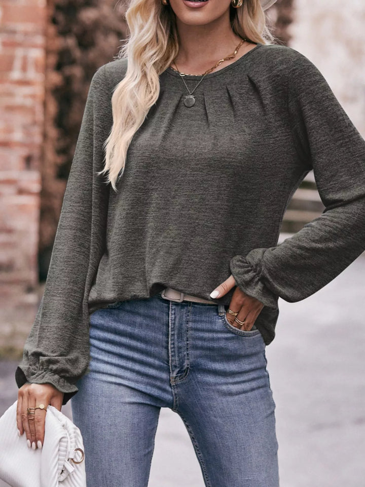Ruffle cuff long sleeve top with pleated neckline