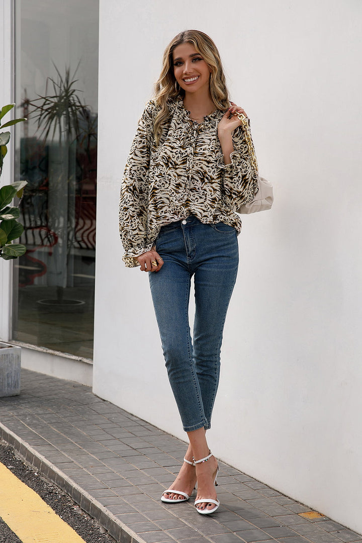 Animal print tie-neck blouse with flounce sleeves