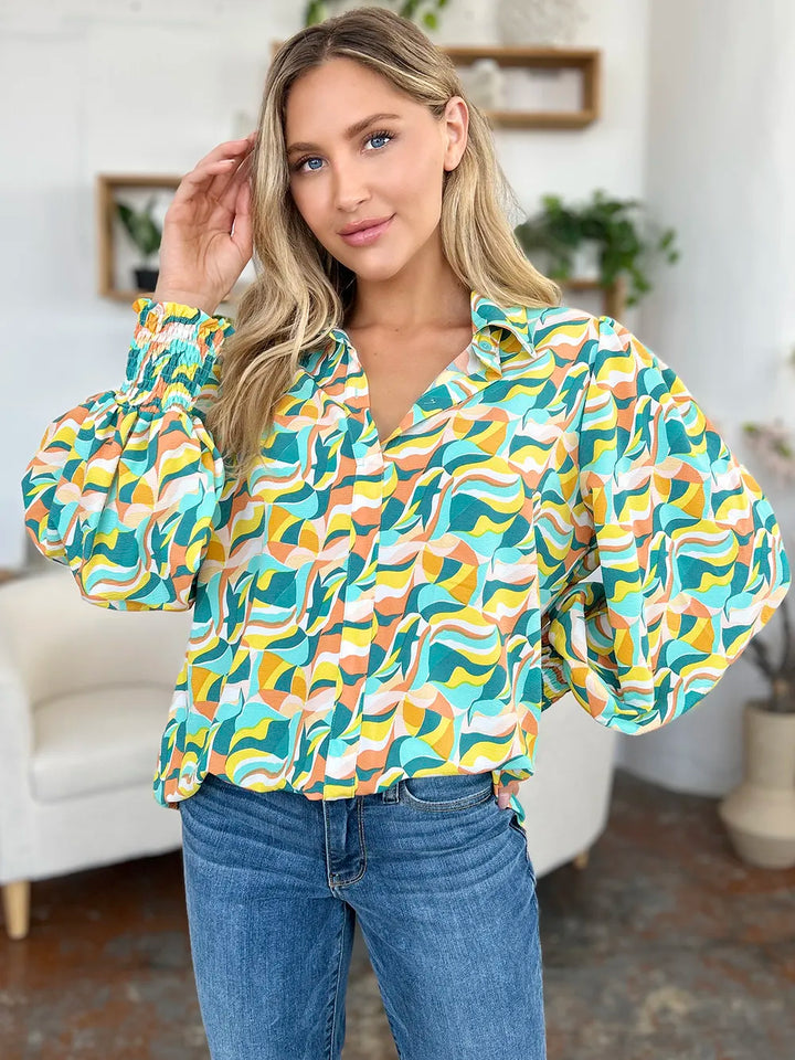 Abstract print smocked balloon sleeve blouse