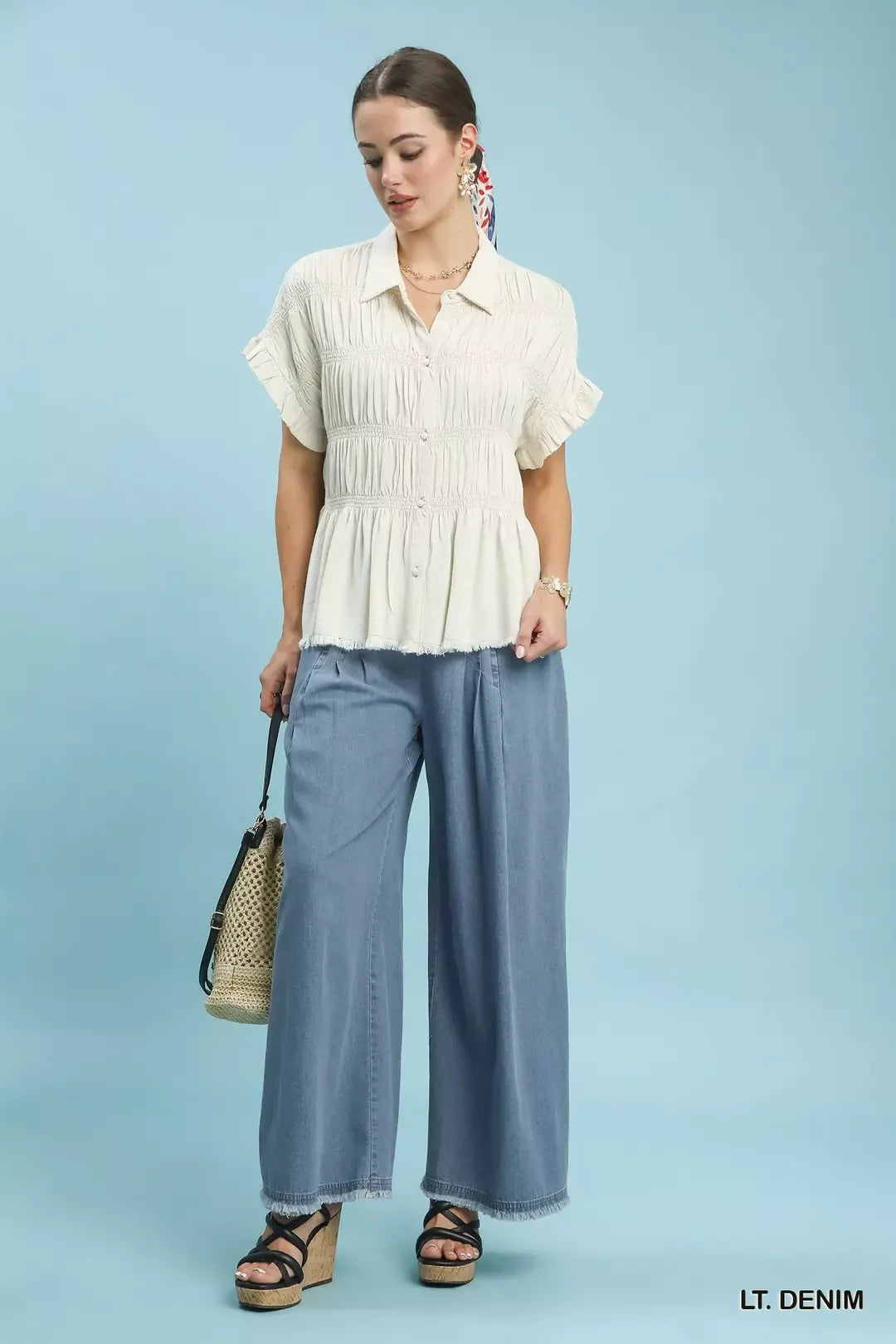 Stone washed wide-leg cotton pants with raw frayed hem