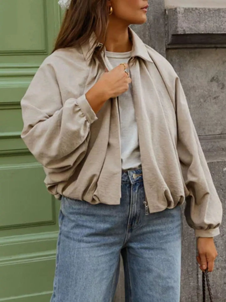 Oversized zip-up bomber jacket with collar and pockets