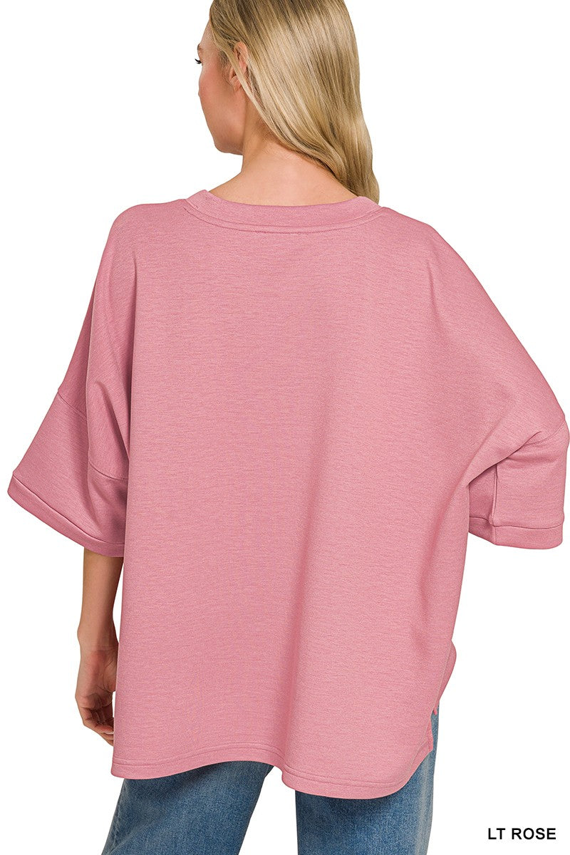 Oversized scuba knit top with drop shoulders and side slits