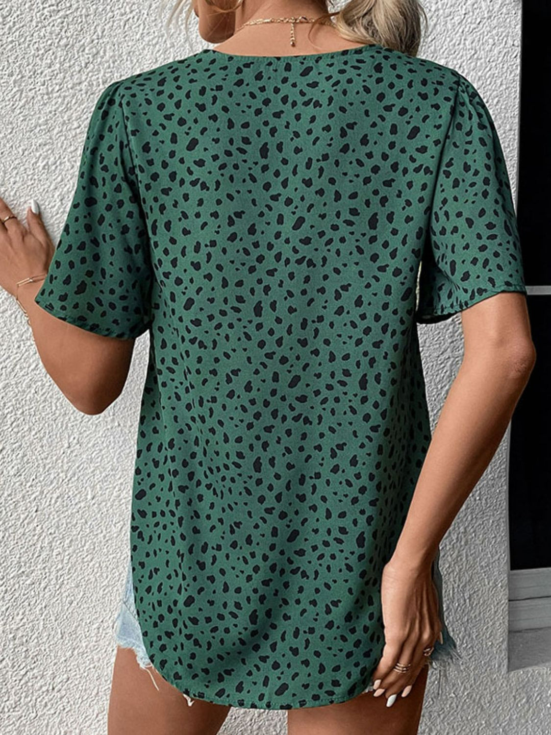 Flutter sleeve animal print V-neck blouse