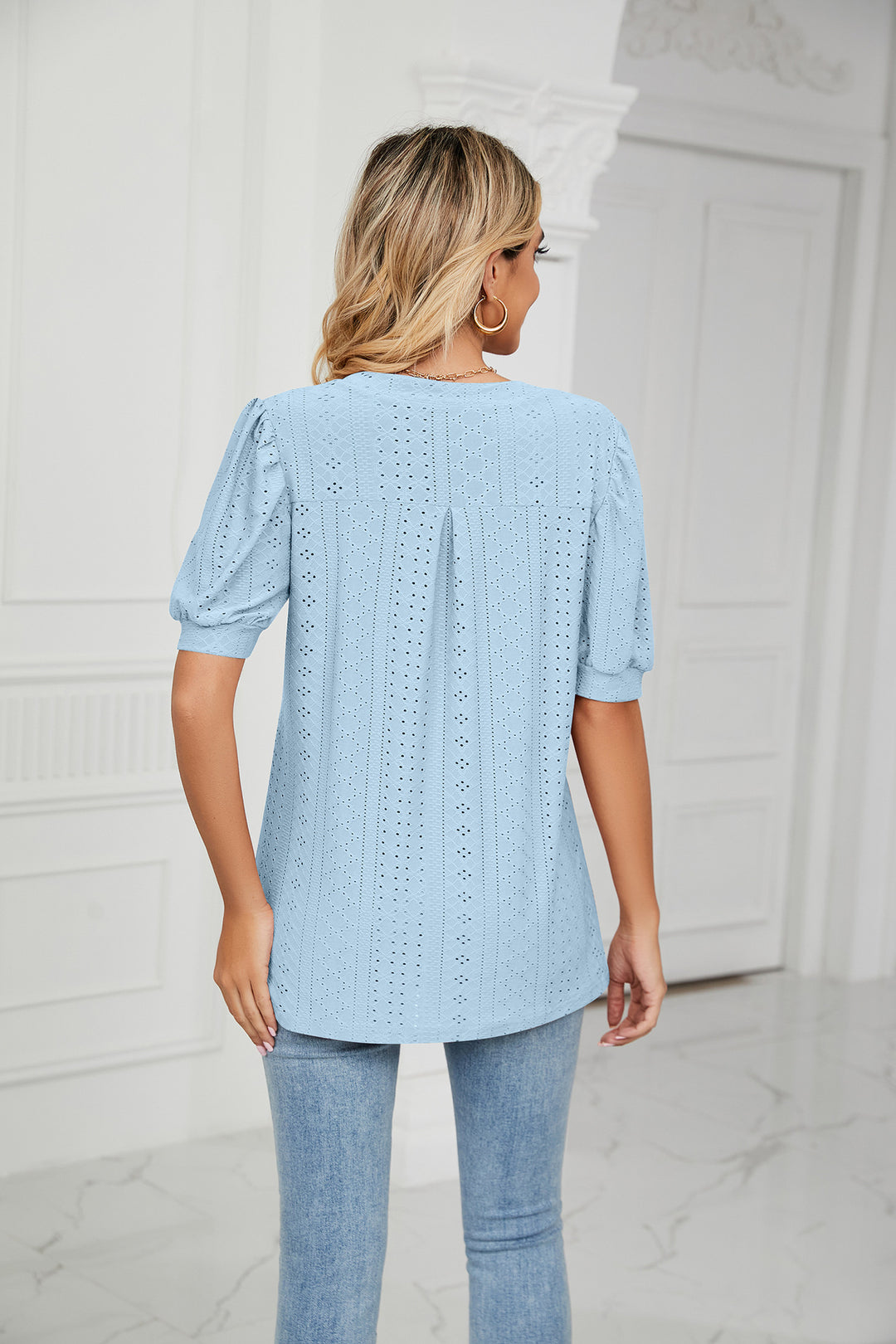Eyelet puff sleeve top with notched V-neck