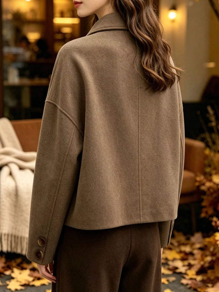 Cropped wool-feel jacket with dropped shoulders and slash pockets