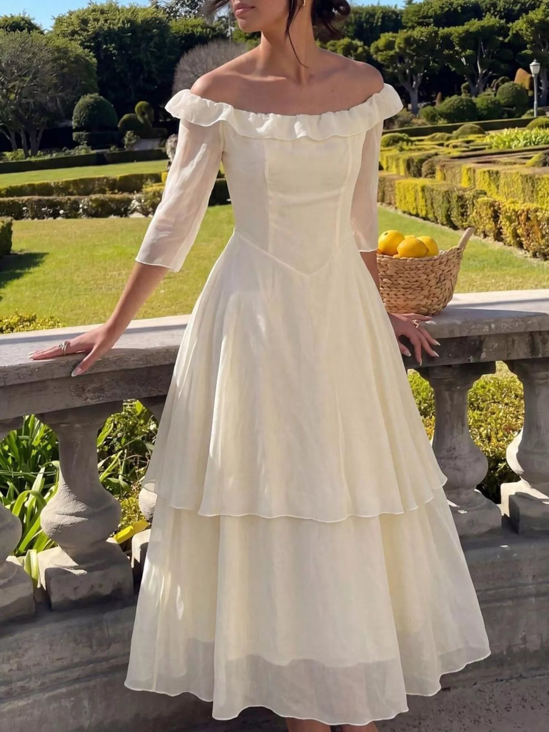 Off-shoulder tiered ruffle midi dress with three-quarter sleeves