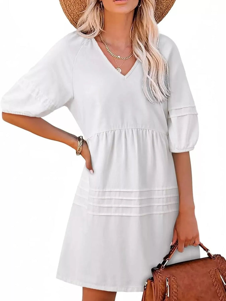 White V-neck puff sleeve denim mini dress with pintuck pleating