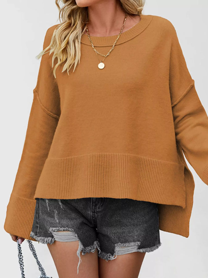 Dropped shoulder flare sleeve sweater with ribbed hem and side slits